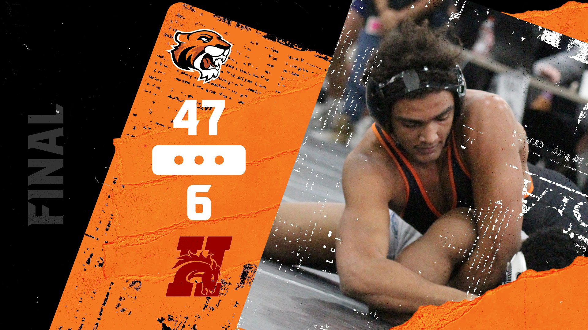 Men's Wrestling Pins Way to Road Win